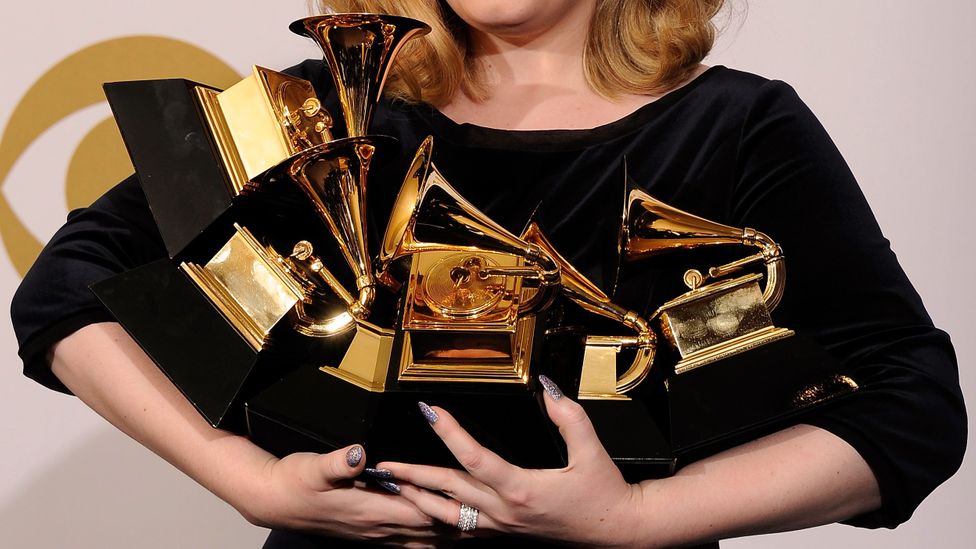 Adele winning Grammy Awards