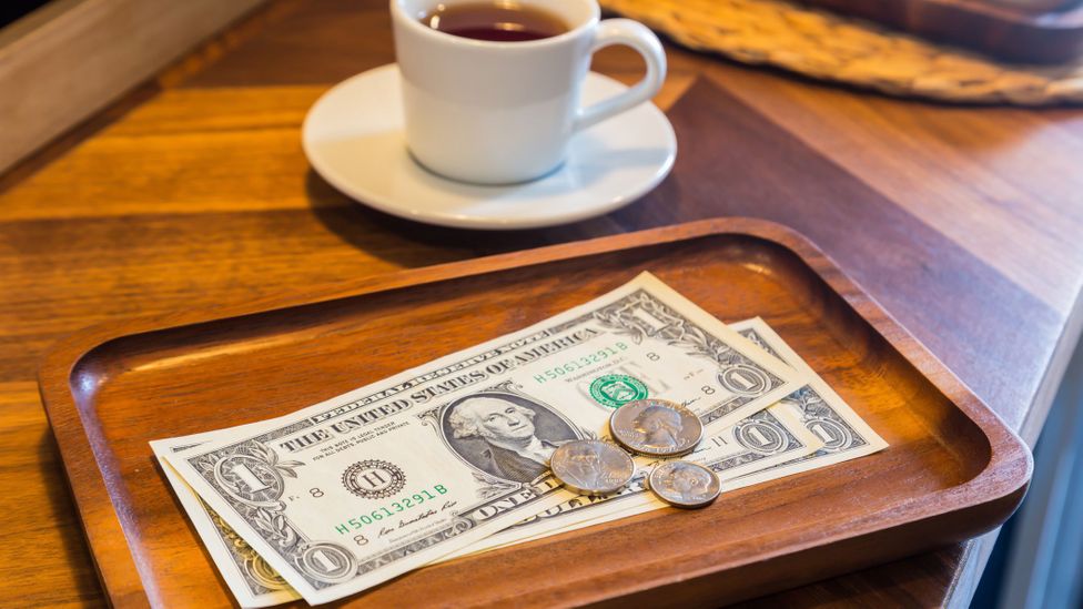 Adding a gratuity is expected across the US, with the rate currently sitting at around 20-25% of a bill (Credit: vinnstock/Getty Images)